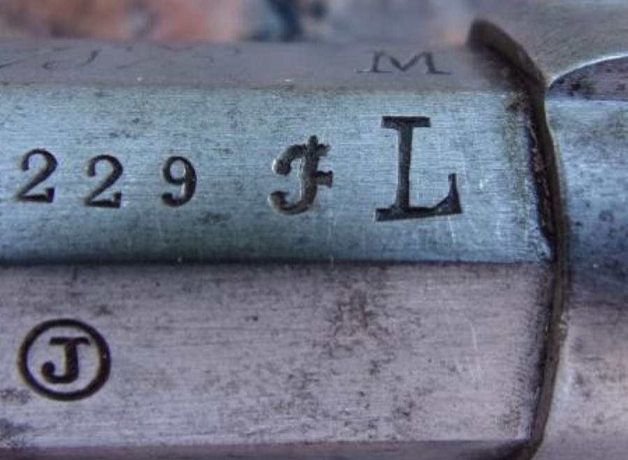 Rajout d'un M et des lettres F et L sur le canon